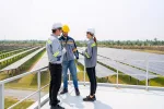 Solar Lights Being Installed By A Team Of Engineers, Highlighting The Professional Application Of Solar Lighting.